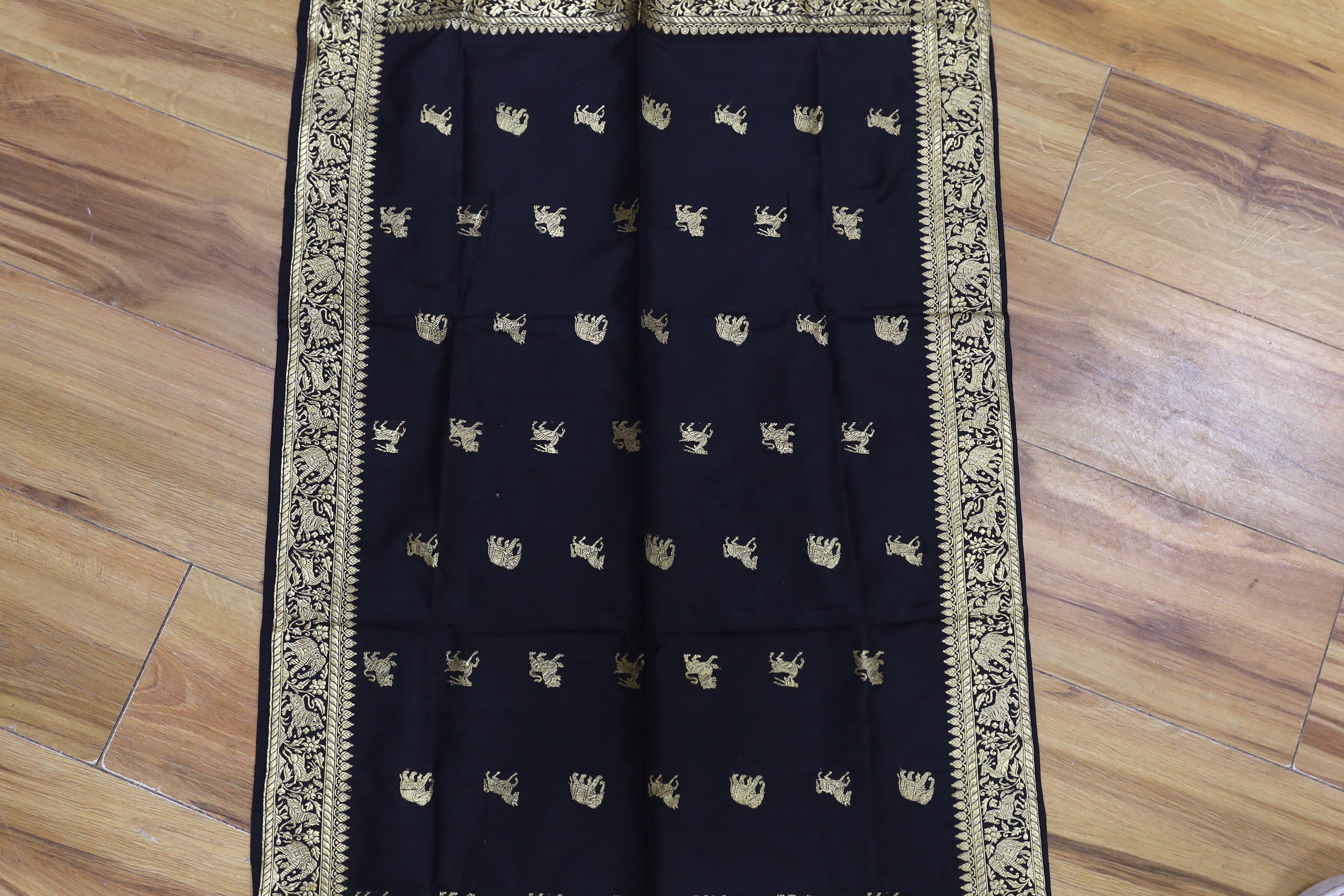 A gold thread Indian embroidered stole, 184 x 57cm